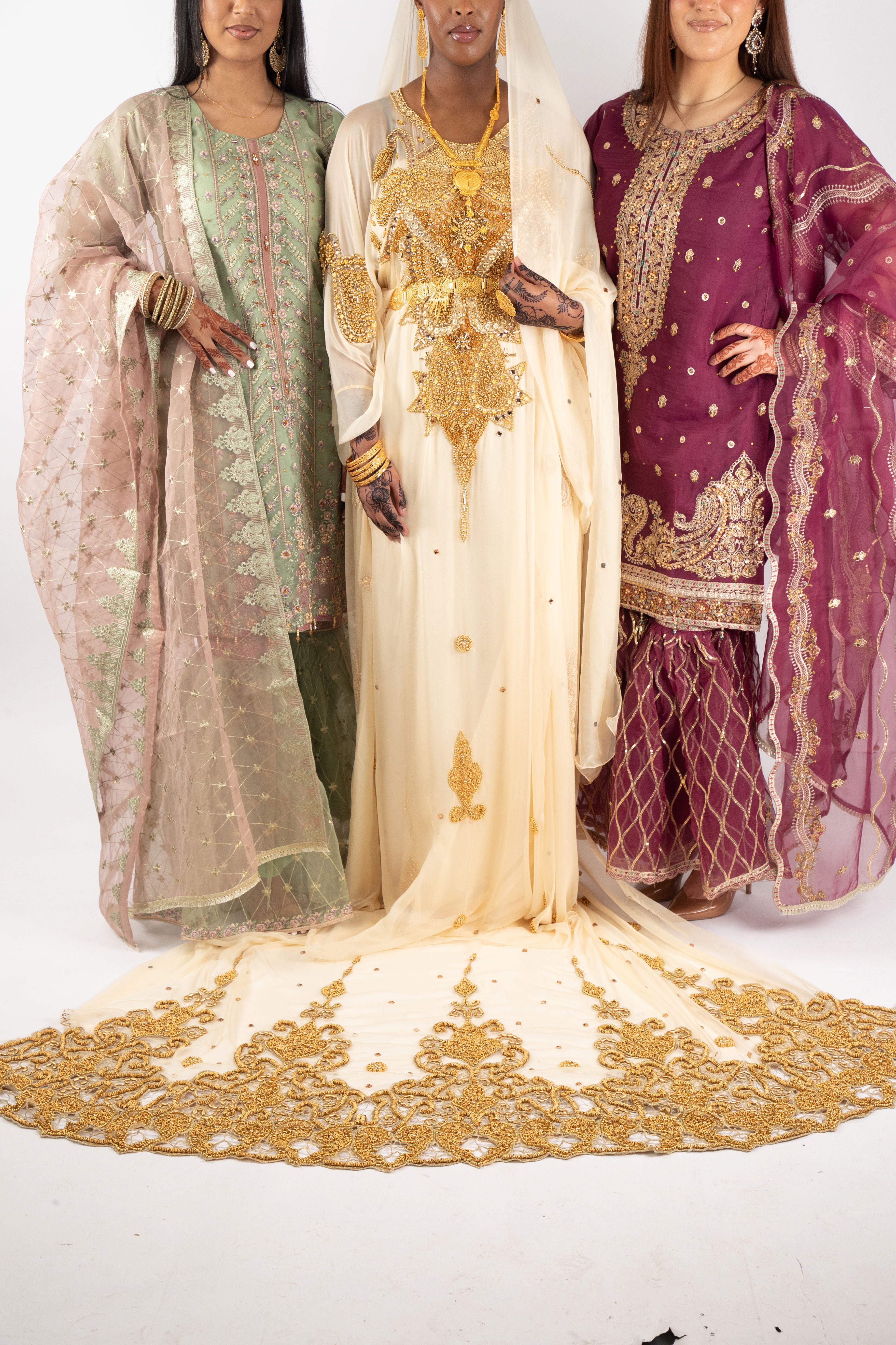 Pakistani and Somali collection worn by three different models.